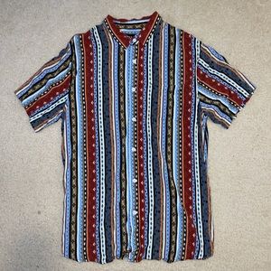 Patterned button down shirt. Size L.